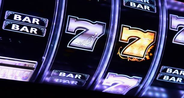 Mobile phone showing baccarat interface on juara102 login